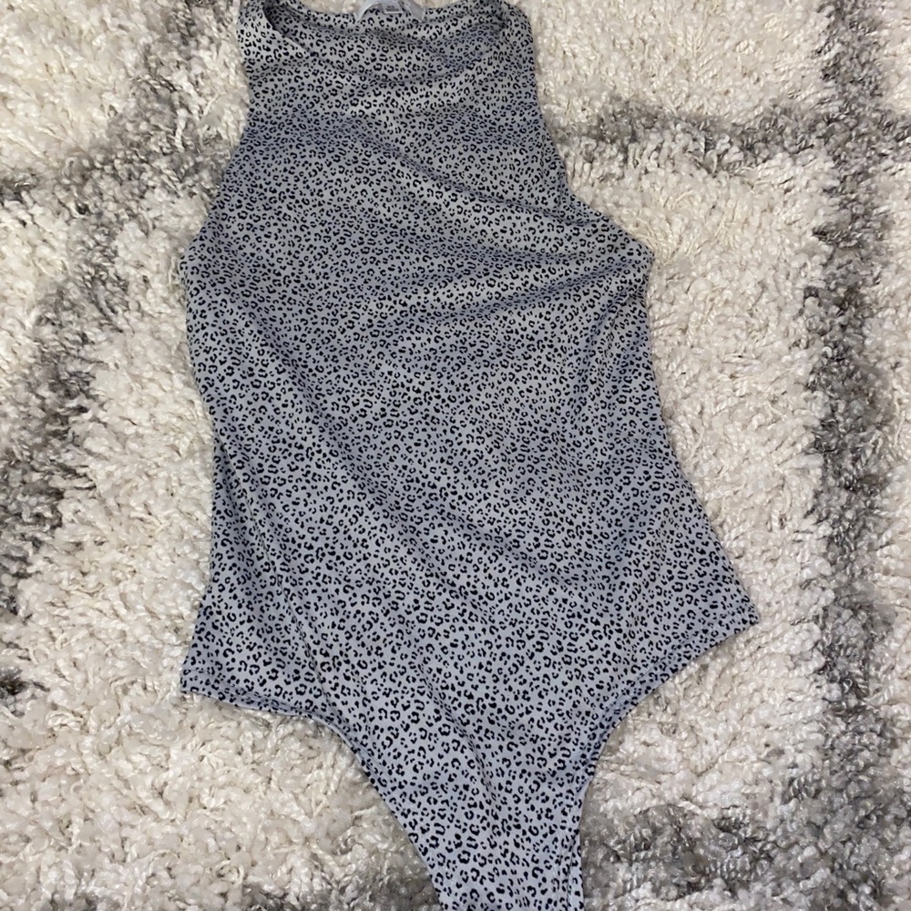 Cheetah print bodysuit tank top. Size: XS